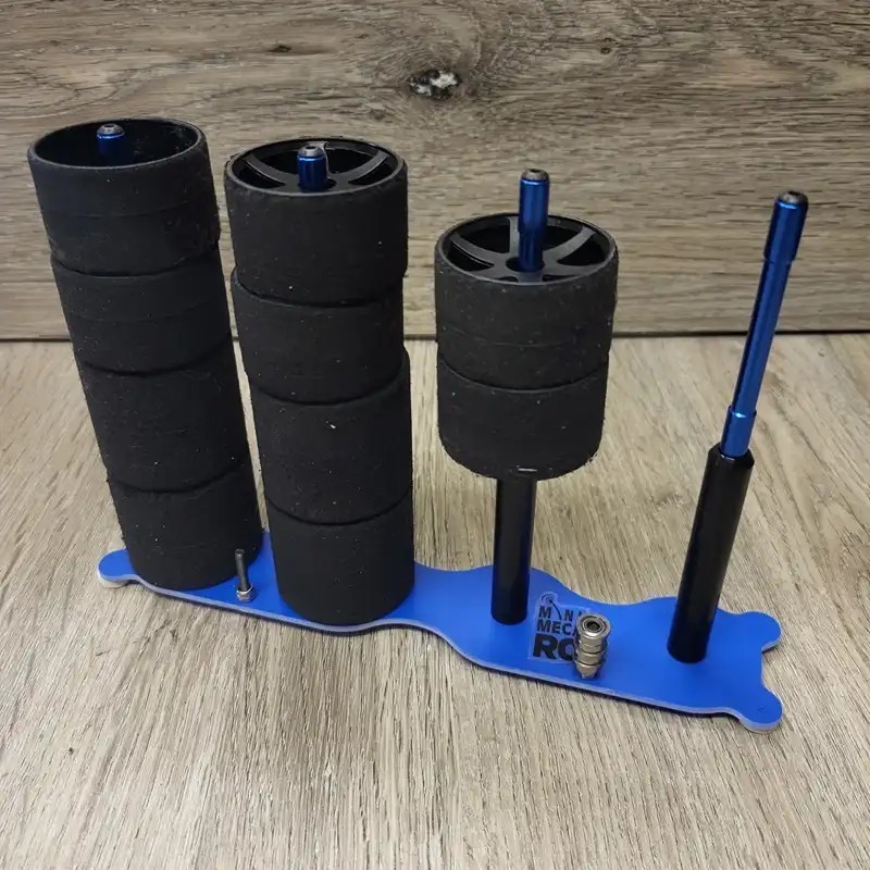 Support bleu pour 4 trains de pneus mousse 1/12 Support bleu pour 4 trains de pneus mousse 1/12