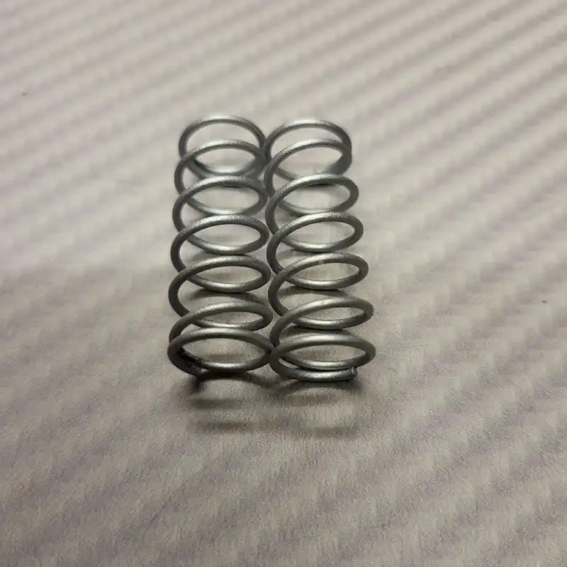 Paire de ressorts latéraux Argent 12 LB pour PRO10 Paire de ressorts latéraux Argent 12 LB pour PRO10